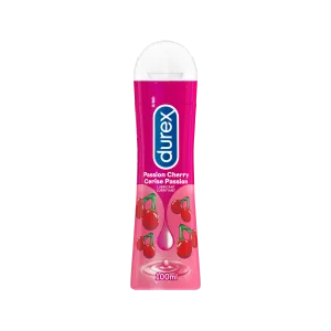 Lubrifiant Durex mangeable aromatisé à la cerise dans une bouteille rose de 100 ml.