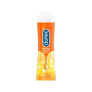 Warming sex lubricant in an orange 100 mL bottle./FR Lubrifiant intime avec effet de chaleur dans une bouteille orange de 100 ml.